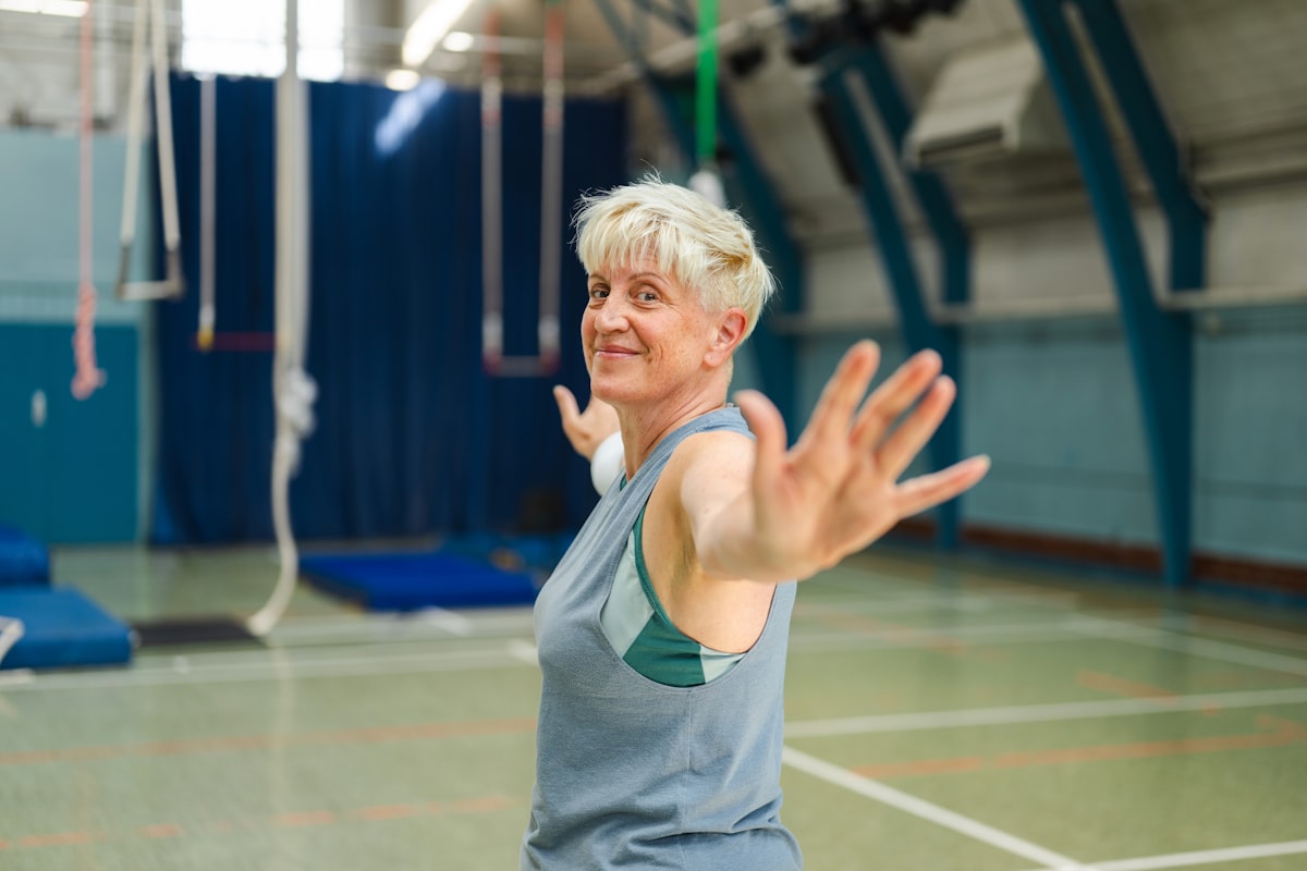 Senior adults doing gentle morning exercise outdoors