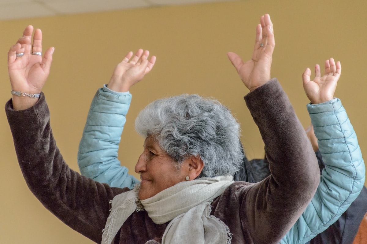 Older adult practicing balance standing on one foot